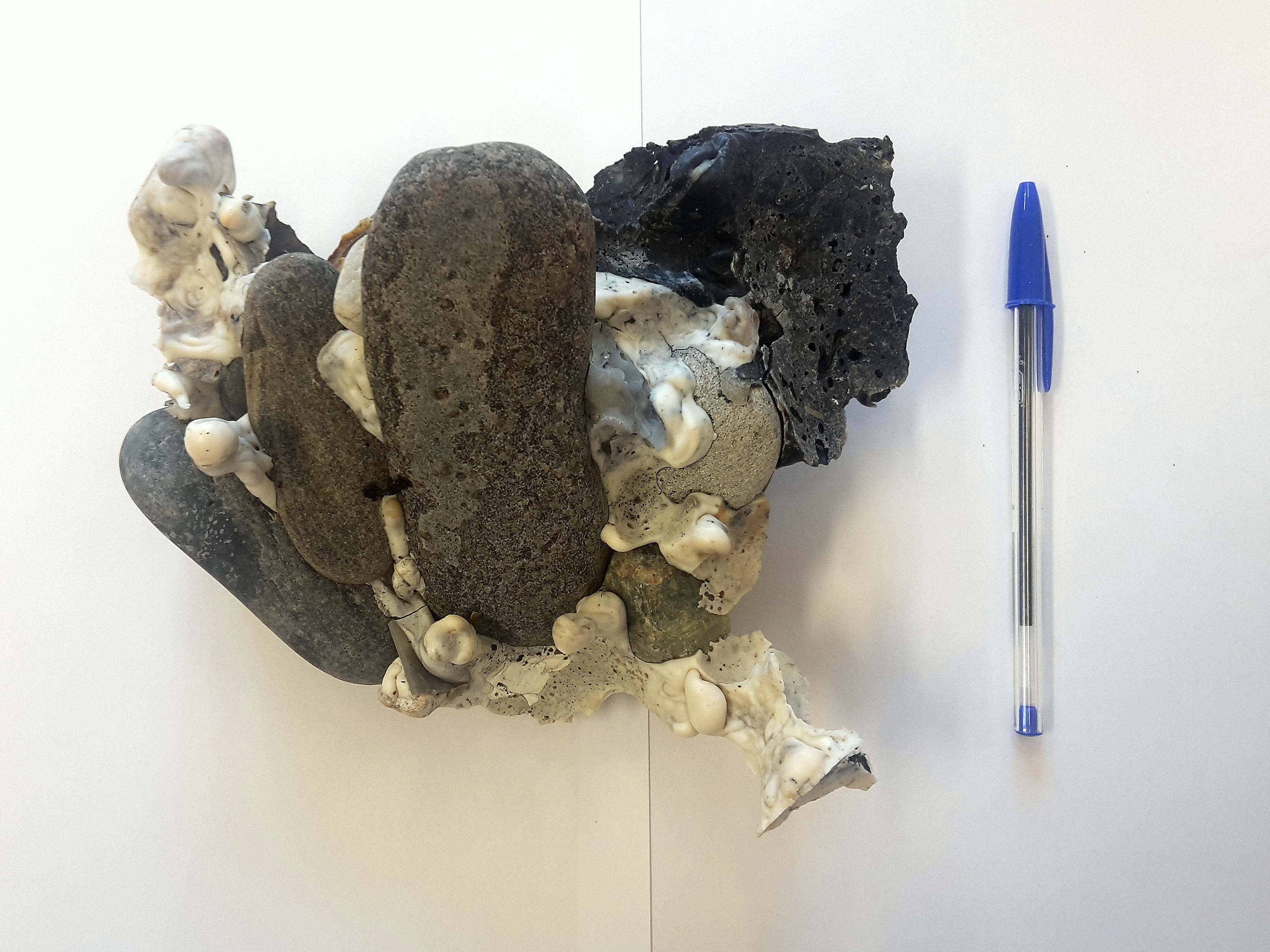 Plastiglomerates: Much of the material Pétursdóttir analyses cannot be traced to a specific place or culture. It has, moreover, been thoroughly transformed and removed from its initial function. Here, Pétursdóttir has photographed a 'plastiglomerate'—natural materials held together by plastic. Photograph: Þóra Pétursdóttir